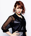 C-ute Okai Chisato - The Middle Management promo.jpg